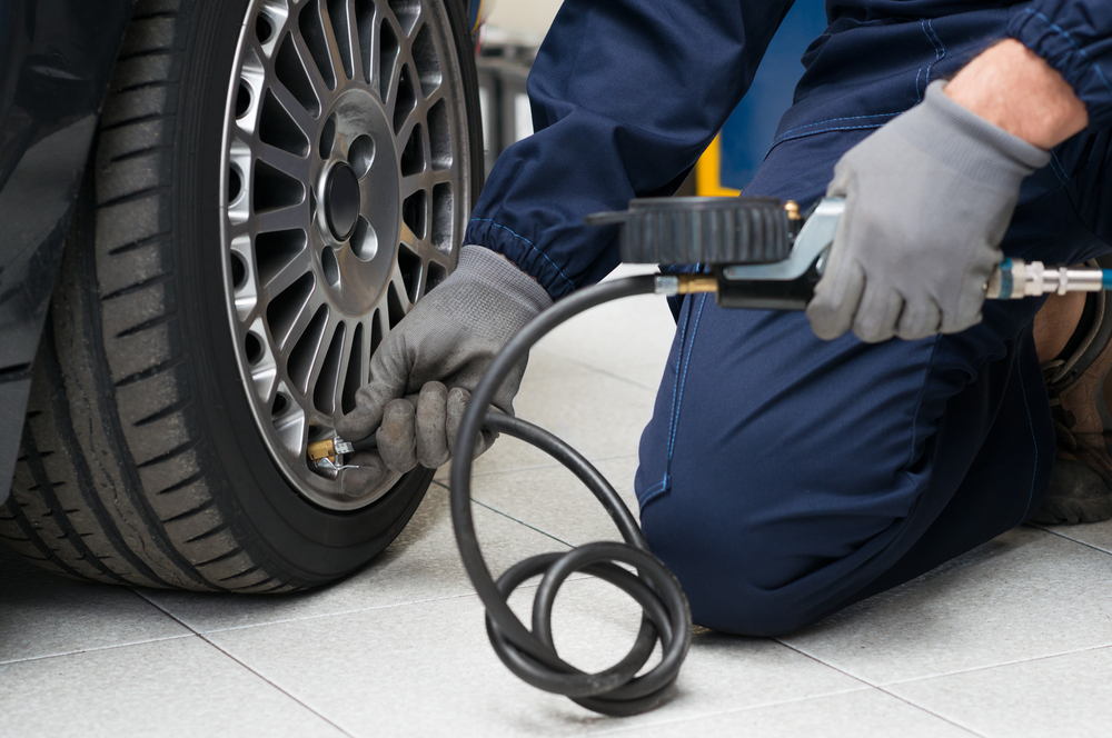 Using a tire pump to inflate a tire